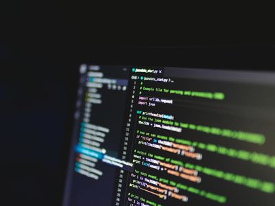 Code lines on a dark monitor screen