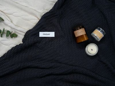 Scented candles and smooth river stones